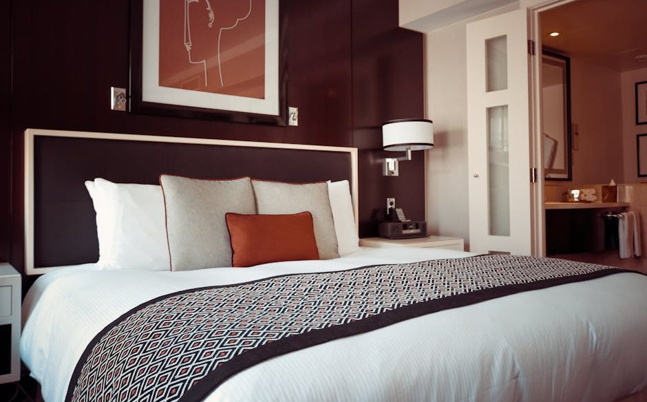 Black and Grey Bedspread on Bed and Pillow